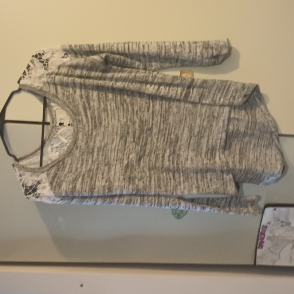 Adorable grey with lace embroidered back. Size M